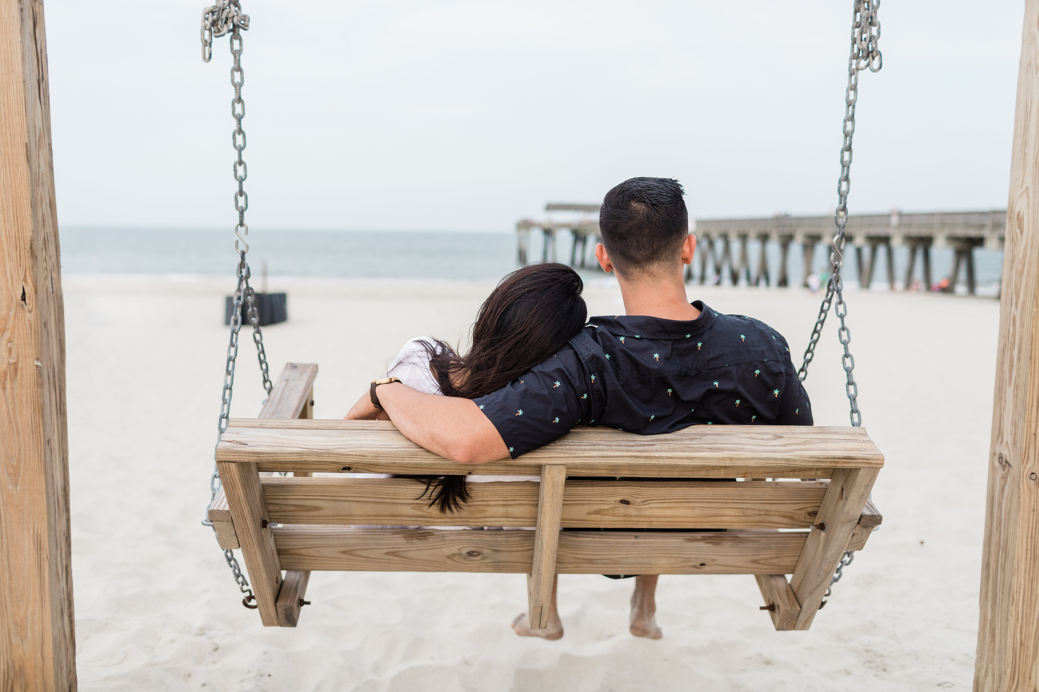 romantic activities beach swing couple