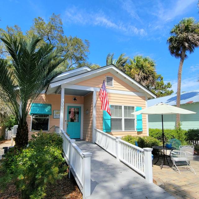 Exterior home view with ramp leading to the door