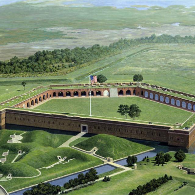 Fort Pulaski’s outer walls and drawbridge surrounded by a calm moat.