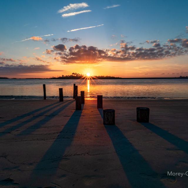 Golden sunset on Back River Beach from the sand