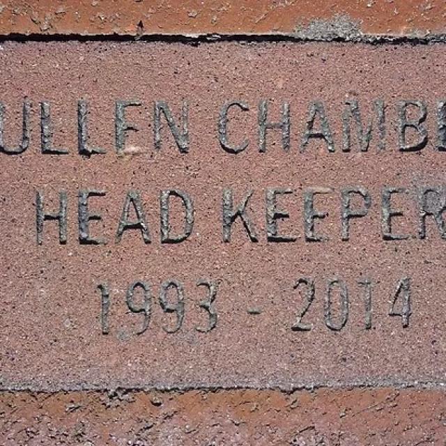 A pathway stone inscribed with the name of the lighthouse head keepers name