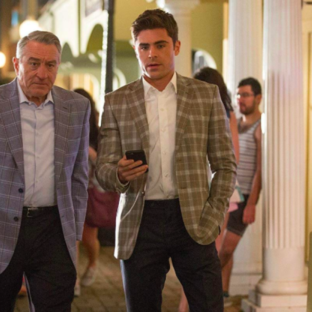 Two male actors in a movie scene.