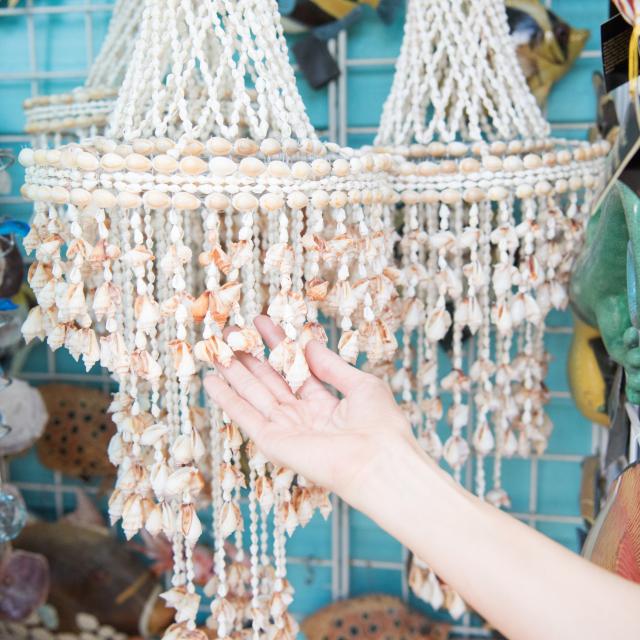 A chandelier made out of seashells
