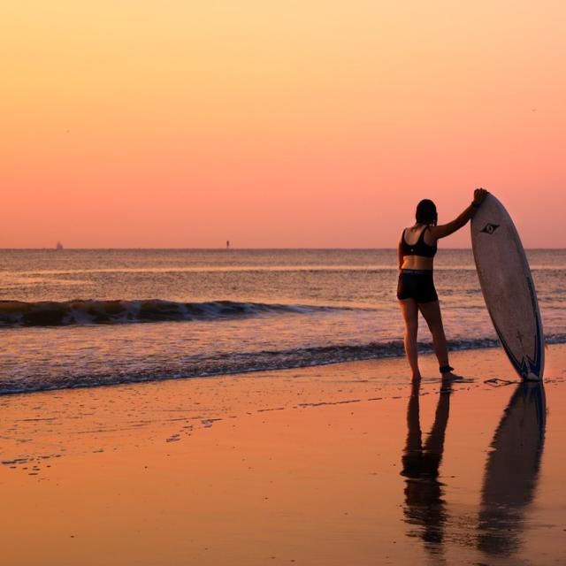 sunset surfing