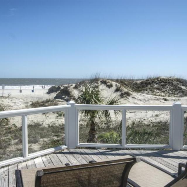 Outdoor deck with oceanfront beach view 