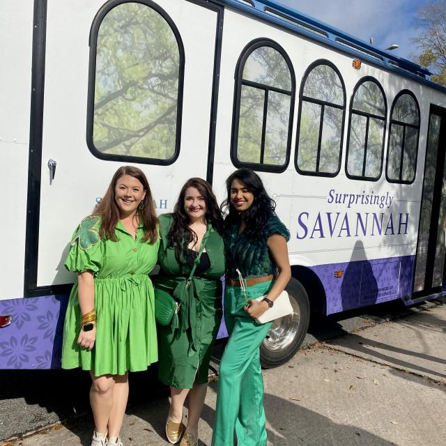 Three ladies in front of trolley in Savannah, GA 