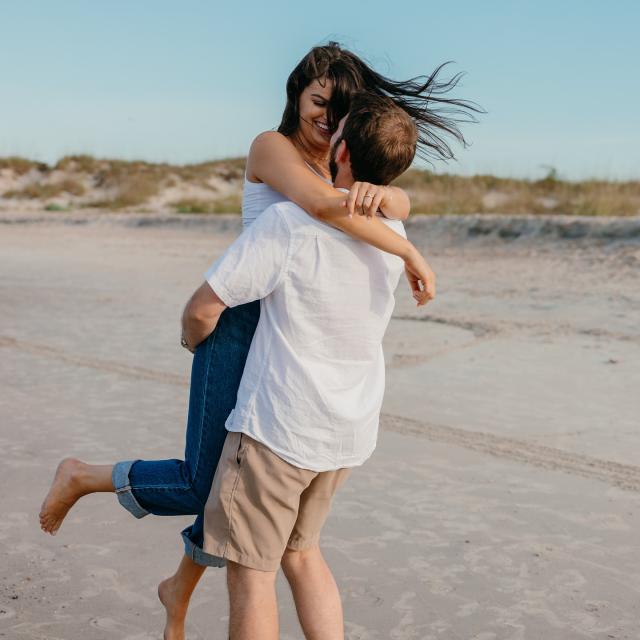 A couple on the beach.