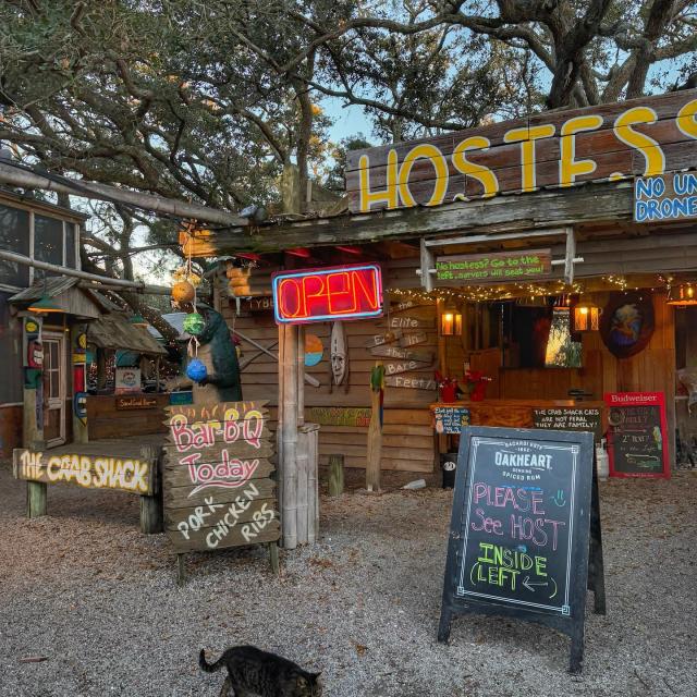 The outdoor front entrance of a quirky beach restaurant.