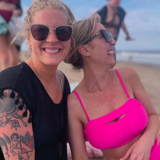 Two friends posing for a selfie on Tybee Island, GA.