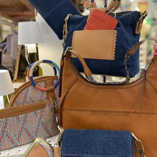 Various purses on display for purchase.
