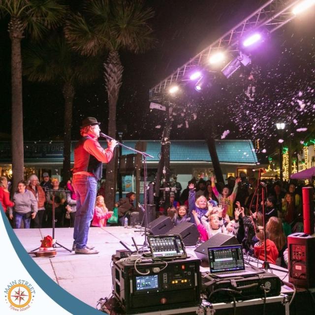 A man hosting a holiday event on Tybee Island, GA.