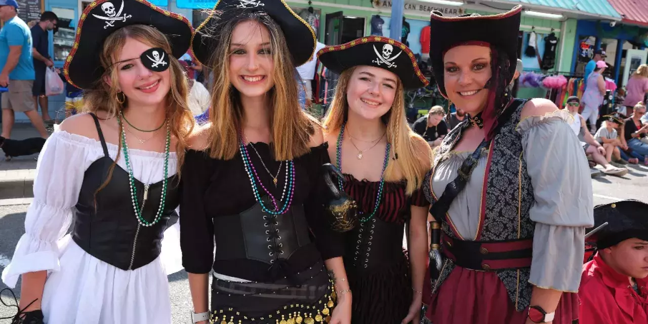 Photo courtesy of Tybee Island Pirate Fest; group, costumes