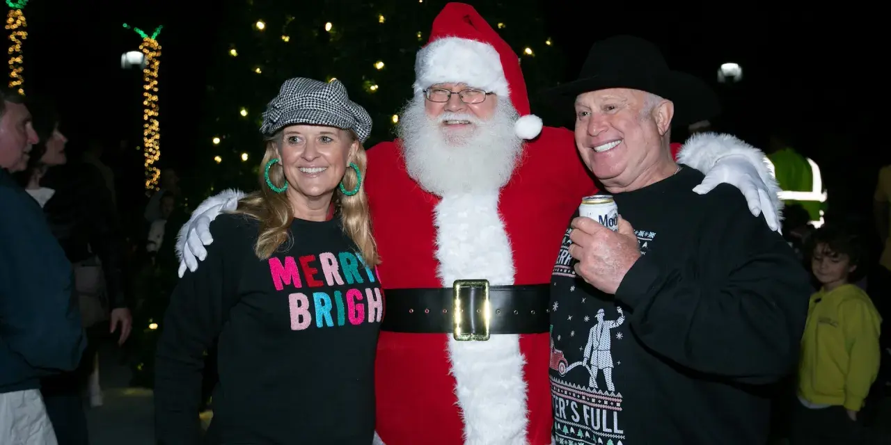 Tybee Island Holiday Market, couple posing with Santa
