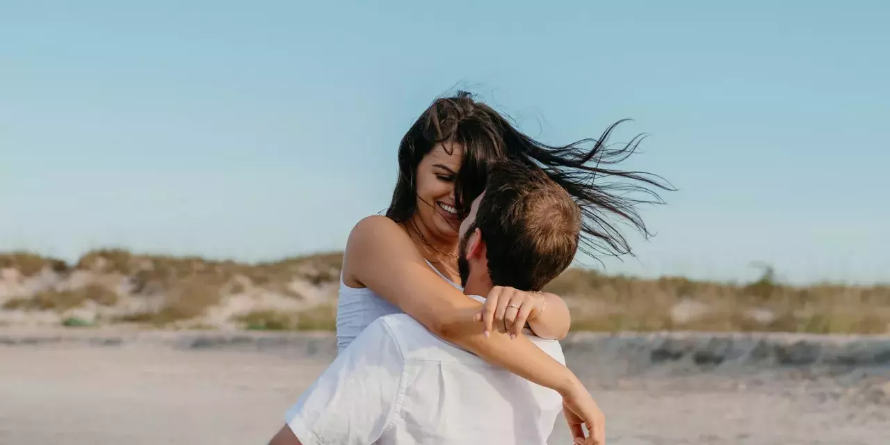 A couple on the beach.