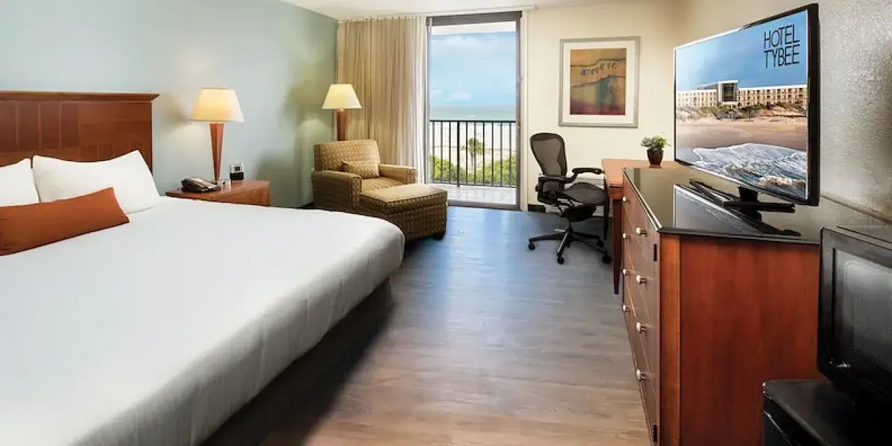 An oceanview king bed hotel room.