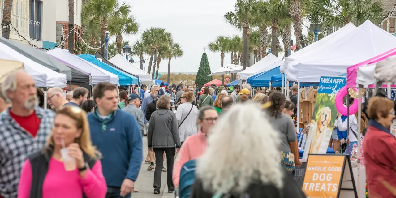A large crowd of people at the Tybee Island Holiday Market.