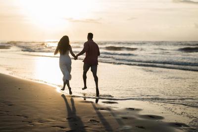 couple running beach