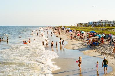Beach goers on Tybee Island, GA.
