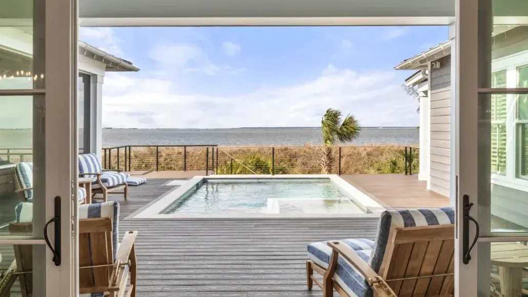 A view of an outdoor pool outside a large beach home on Tybee Island, GA.