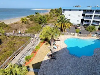 Aerial pool, deck and ocean view of Bay View Villas