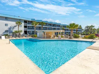 Outdoor pool with multiple condo units 