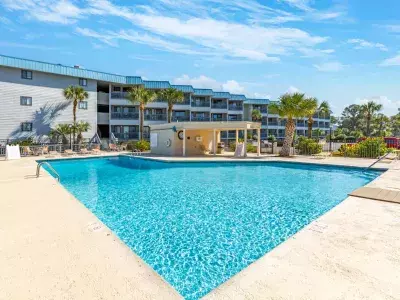 Outdoor pool with multiple condo units 