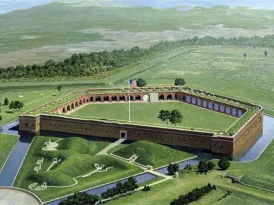 Fort Pulaski’s outer walls and drawbridge surrounded by a calm moat.
