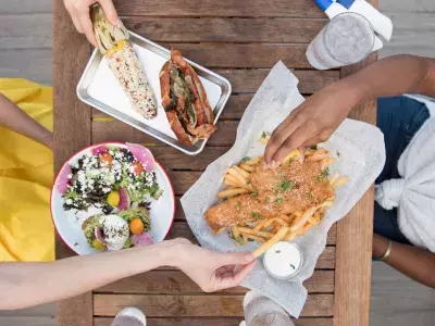 Several seafood dish options on a table.