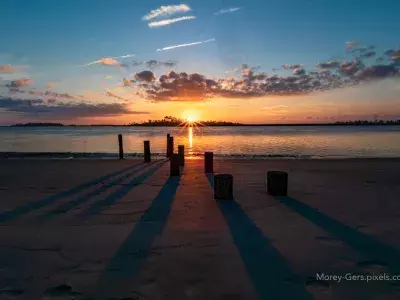 Golden sunset on Back River Beach from the sand