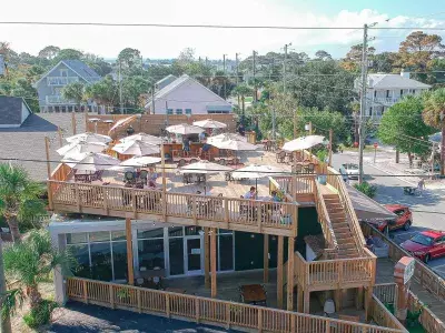 An aerial view of a restaurant’s outdoor seating decks