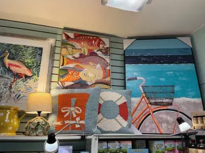 A display wall of artwork and home decor.