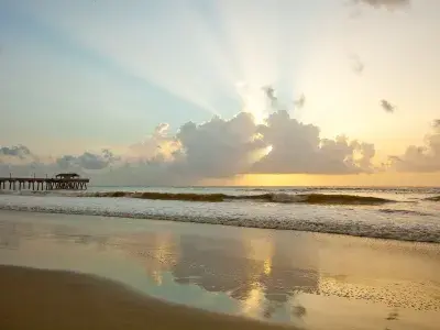 tybee-island-pier-sunrise-clouds-attractions-south-beach