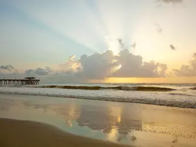 tybee-island-pier-sunrise-clouds-attractions-south-beach