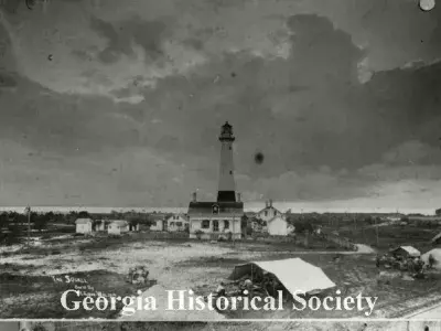 Black and white aerial image of the historic Tybee Island Lighthouse