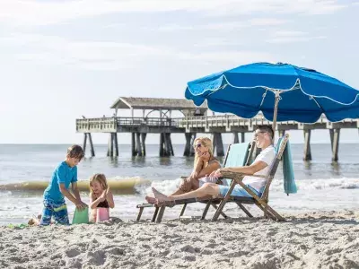 tybee island beach pier family sandcastle