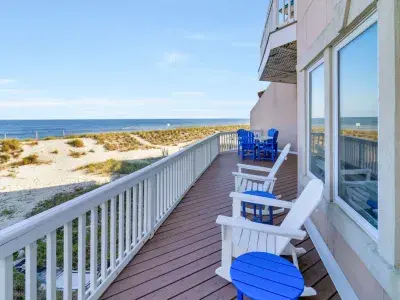 Balcony with oceanfront and beach view