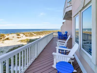 Balcony with oceanfront and beach view