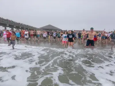 Tybee Polar Plunge, large group of people going into the water