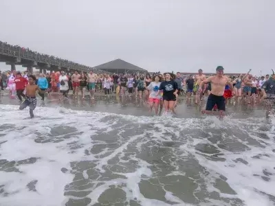 Tybee Polar Plunge, large group of people going into the water