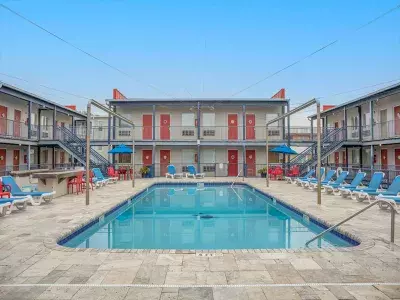Outdoor hotel pool with ample seating