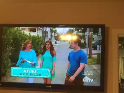 An image of a TV screen playing an HGTV show.