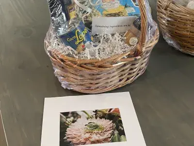 A congratulatory wedding gift basket on a table