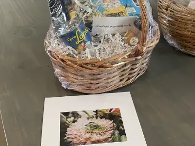 A congratulatory wedding gift basket on a table