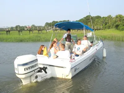 A group of people boating in the ocean