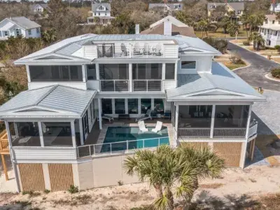 The exterior view of a large beach home on Tybee Island, GA.