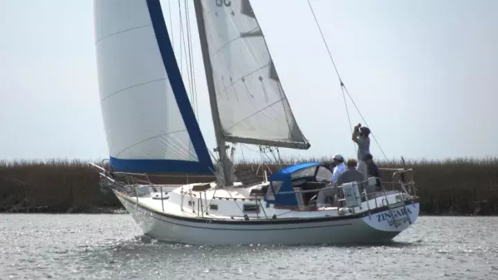 A sailing yacht in the ocean.