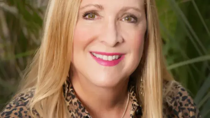 A woman’s headshot.