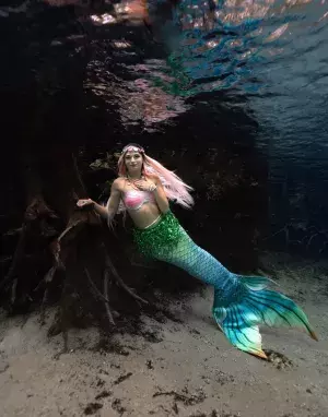 Woman dressed as a mermaid underwater