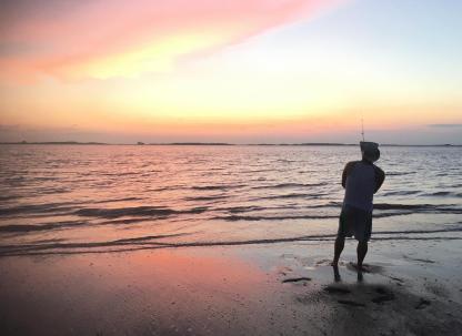 fishing tybee island beach sunset