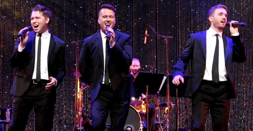 3-man tribute band performing on stage